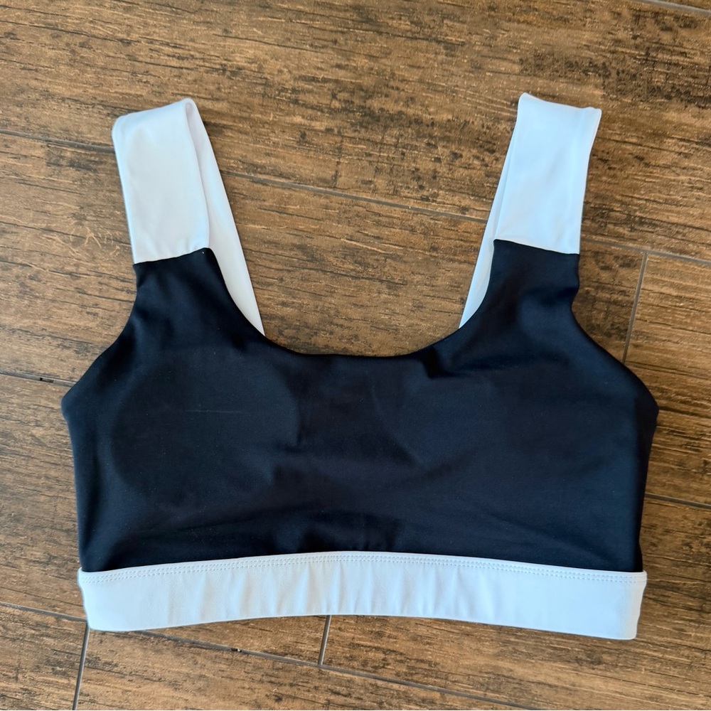 All Fenix black and white crop sports bra, featuring thick strap Size L
